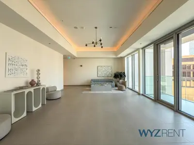 a lobby of a building with large windows at Emerald Boho Escape1BR in Forte near Burj Khalifa in Dubai
