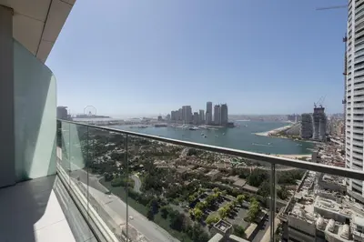 a view of the singapore river from the top of a building at Luxury 2BHK Sea & Palm Views 20th Floor Tram line in Dubai