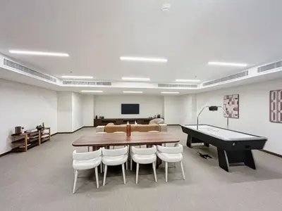 a conference room with a ping pong table and a pool table at Locations l Chic 3 Bedroom l Burj and Fountain Views l Downtown Dubai in Dubai