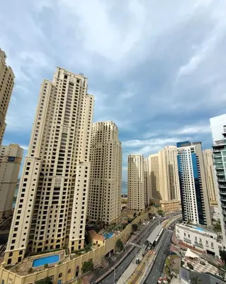 a view of a city with tall buildings at Sansa Beach Home in Dubai