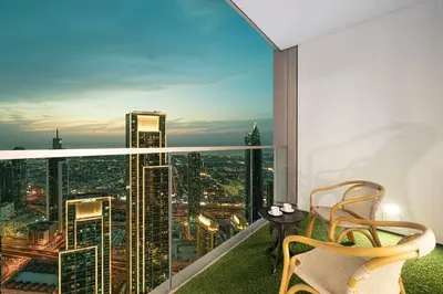 a balcony with a view of a city at Luxury Grande Suites by Hostiva - Full City View in Dubai