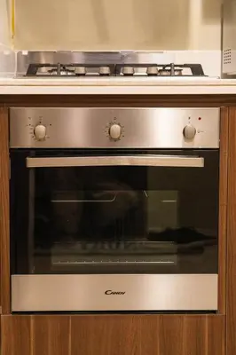 a microwave oven sitting inside of a kitchen at 2BhK Big Balcony&Canal View Waterfront dubai mall in Dubai
