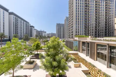 arial view of a city with tall buildings and trees at StayShort - Dubai Hills sleeps 4 in a Great Location in Dubai