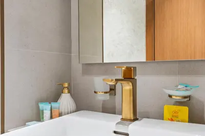 a bathroom with a sink with a faucet at luxury Madrid Studio-Binghatti Azure in Dubai