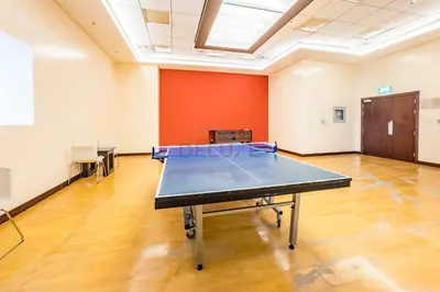an empty room with a ping pong table in it at Sky-Level 2BR with Partial Marina View, Just Steps to Dubai Tram and Minutes from the Beach, Elite Residence, Dubai Marina by Deluxe Holiday Homes in Dubai