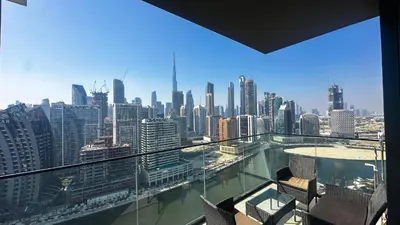 a view of a city skyline from a building at AWS Holiday Homes - Iconic Burj Khalifa Views in Dubai