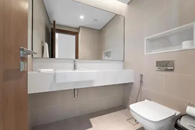 a bathroom with a sink and a toilet at 2BR with M CF7B Pet Friendly Stay in Dubai