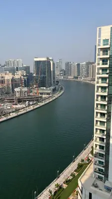 a view of a river in a city with buildings at Bussinss bay in Dubai