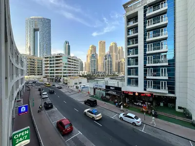 a view of a city street with cars and buildings at Minimalist Studio with Amazings Marina Canal Views in Dubai