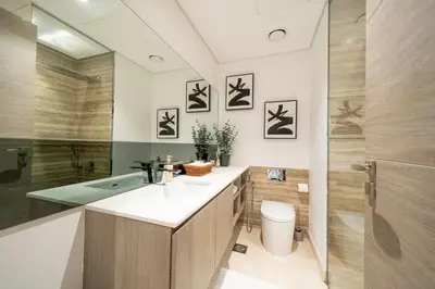 a bathroom with a sink and a shower and a toilet at Smart Studio in Business Bay Near Burj Khalifa in Dubai