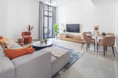 a living room with a couch and a table at Frank Porter - Marina Wharf 1 in Dubai