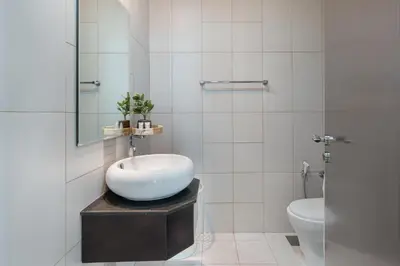 a bathroom with a bowl sink and a toilet at Modern 2 Bedroom in Dubai Marina - Sea View in Dubai