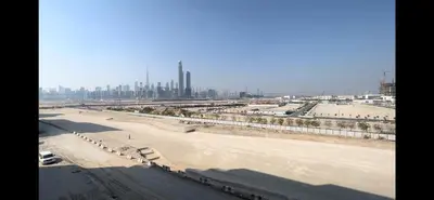 an aerial view of a city with a river at Mahenti - Contemporary Studio Living in Meydan in Dubai