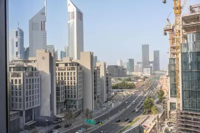 a view of a city with tall buildings at StayShort - Extravagant Studio in DIFC with Skyline Views in Dubai