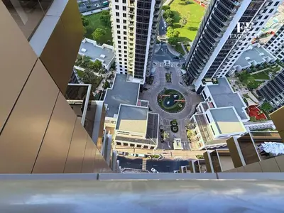 an overhead view of a city with tall buildings at Spacious 1 Bed with Burj Khalifa View accommodates 3 or 4 in Dubai