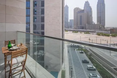 a balcony of a building with a view of a city at Frank Porter - Canal Front Residence 9A in Dubai