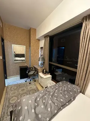 a bedroom with a bed and a desk and a window at Private Room Steps from Jumeriah Beach & Marina Walk - LMY Sadaf 7 JBR Dubai in Dubai
