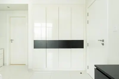 a white bathroom with black and white walls at CitiHome - Elegant 1BR - Bay View - Prime Location in Dubai