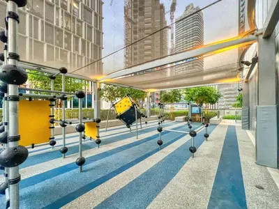a city street with a bus stop at 3BR in Vida Dubai Mall with Stunning Burj Khalifa View in Dubai