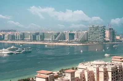 a view of a city with a river and buildings at Amazing Palm View - Prime Location - Spacious in Dubai