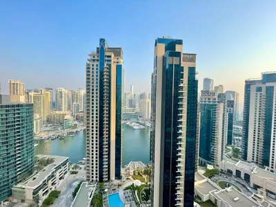 a view of a city with tall buildings and a river at Tiramisu - Luxurious 2 BR Apartment- JBR Beach in Dubai