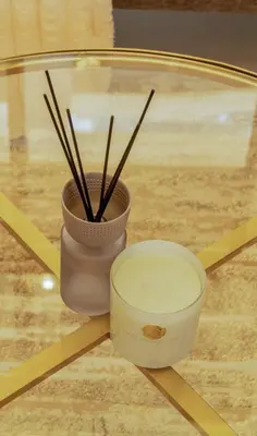 a bowl and chopsticks sitting on top of a table at Brand New 1BR Apartment in JVC in Dubai