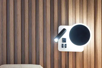 a coffee cup on a holder on a wall at Canal Walk Luxury Studio Central Business Bay in Dubai
