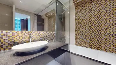 a bathroom with a sink and a shower at Vacationer l Stylish 1 Bedroom l Downtown Dubai l Pool, Gym Access in Dubai