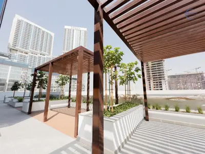 a pavilion in a city with trees and buildings at Modern Retreat at Azizi Azure, Meydan in Dubai