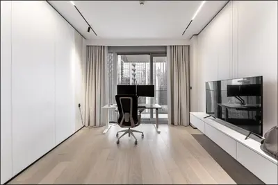 an office with a desk and a computer in a room at Opera Grand Sky Luxurious 3-Bedroom Apartment in Downtown Dubai with Panoramic Burj Khalifa View in Dubai