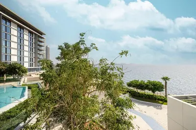 a view of the ocean from the balcony of a building at 2 Bedroom Bluewaters Retreat with Office and Pool Views in Dubai