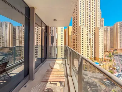 a balcony with a view of a city with tall buildings at Chic Stay in Sparkle Towers in Dubai