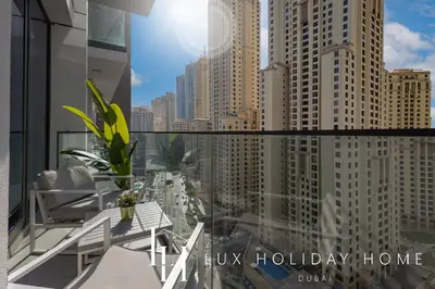 a balcony with a view of a city at LUX LIV Contemporary Marina View Suite 2 in Dubai