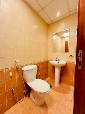 a bathroom with a toilet and a sink at Marina View Towers - Dubai Marina Walk Access - View - 1BHK - Marsa in Dubai