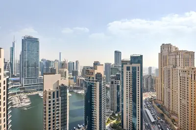 an aerial view of a large city with buildings at Modern 3BR in Rimal 5, JBR Dubai in Dubai