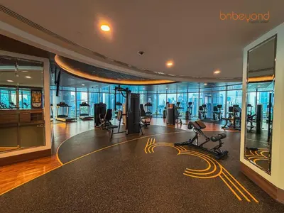 a gym with exercise equipment in a building at Urban Grandeur at Imperial Avenue in Dubai