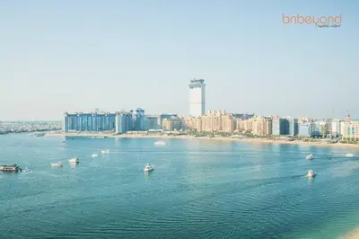 a view of a river with boats in the water at Private Beach Access with Luxury Beachfront Lifestyle in Dubai