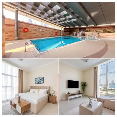 a bedroom and a living room with a swimming pool at Chic 1BR w Pool Sauna & Steam Room Access in Dubai