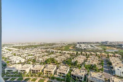 an aerial view of a city with apartment complexes at Modern 1Bed near Parks and Famous Golf Clubs in Dubai