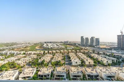 an aerial view of a large apartment complex at Modern 1Bed near Parks and Famous Golf Clubs in Dubai