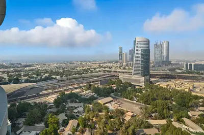 an aerial view of a city with tall buildings at Spacious modern 2 Bed and Maids I Sleeps 7 in Dubai