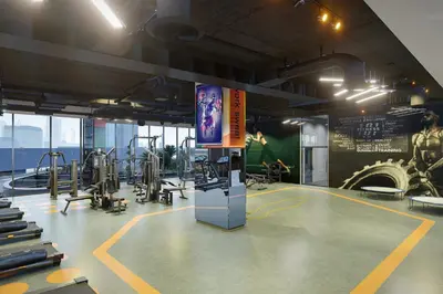 a gym with treadmills and machines in a room at Chic 1-Bedroom Retreat in Heart of Business Bay in Dubai