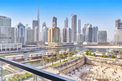 a view of a city with a river and buildings at Khalifa View Luxe 1BHK in Dubai