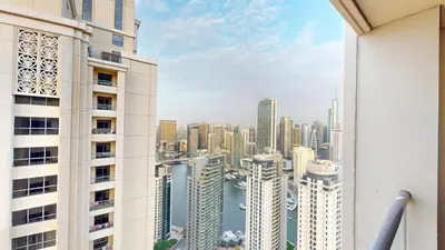 a view of a city skyline from a building at Vacationer I Luxury 2 Bedroom Apartment I Marina View I Steps from JBR Beach in Dubai