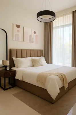 a bedroom with a large bed and a window at Modern 1BR Near Burj Khalifa Business Bay Reva Apt in Dubai