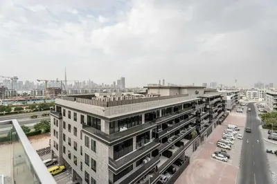 an overhead view of a building in a city at Elegant 3BR & City Skyline View Azizi Greenfield in Dubai