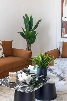 a coffee table in a living room with a couch at Frank Porter - La Sirene, Jumeirah in Dubai