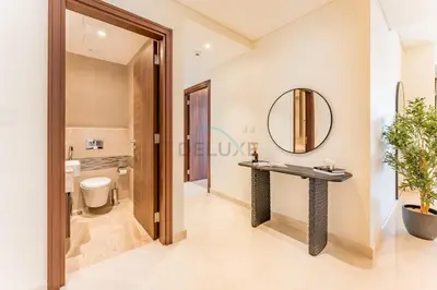 a bathroom with a sink and a mirror at Breathtaking Burj Khalifa Views from a High-Floor 3BR with an Assistant Room, Just Minutes from Dubai Mall and Downtown Attractions, Imperial Avenue, Downtown Dubai by Deluxe Holiday Homes in Dubai
