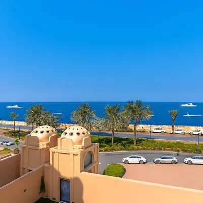 a view of the ocean from the balcony of a building at Sunset Beach Escape at Palm Jumeirah 2BR 241 by The Rosewood Vacation Homes Rental LLC in Dubai