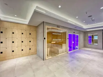 an empty room with a closet with purple lights at Studio in downtown of Dubai in Dubai